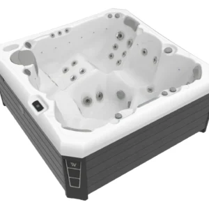 Spa Málaga de Wellis en color blanco perla con mueble gris y 6 plazas de hidromasaje.